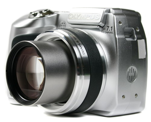 ����� Canon SX100 IS � Olympus SP-510UZ